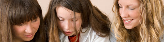 Three students reading